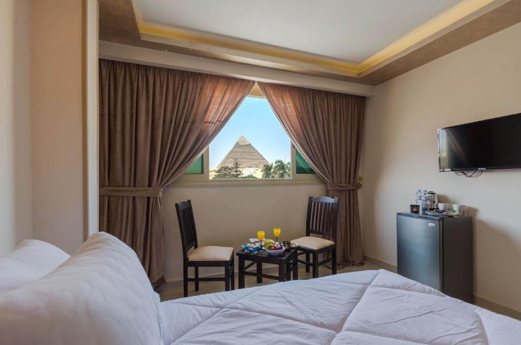 Pyramids Energy Bed & Breakfast ไคโร ภายนอก รูปภาพ